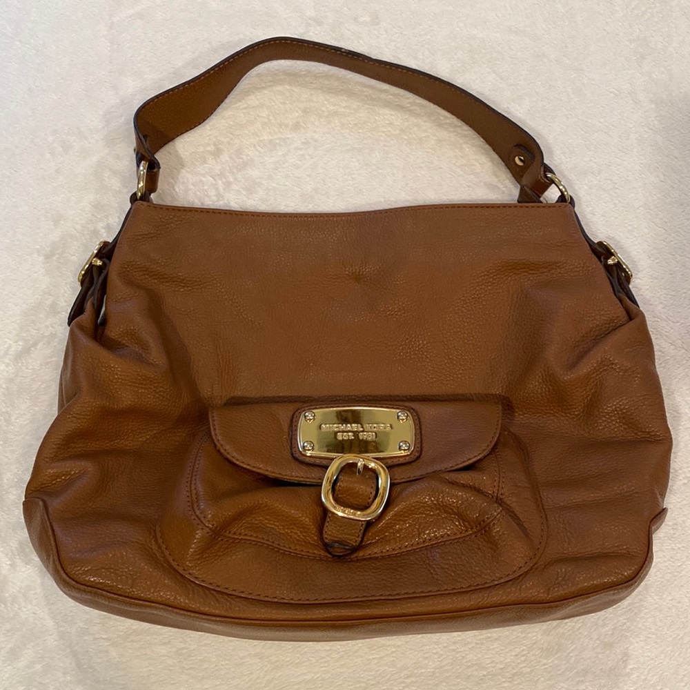 Michael Kors tan peddled leather shoulder bag.